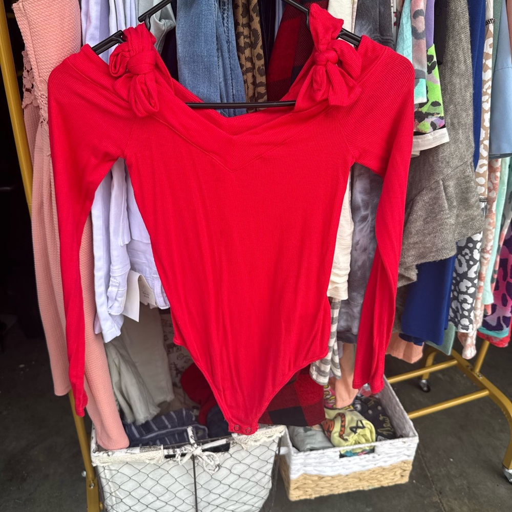 Express bow off shoulder body suit